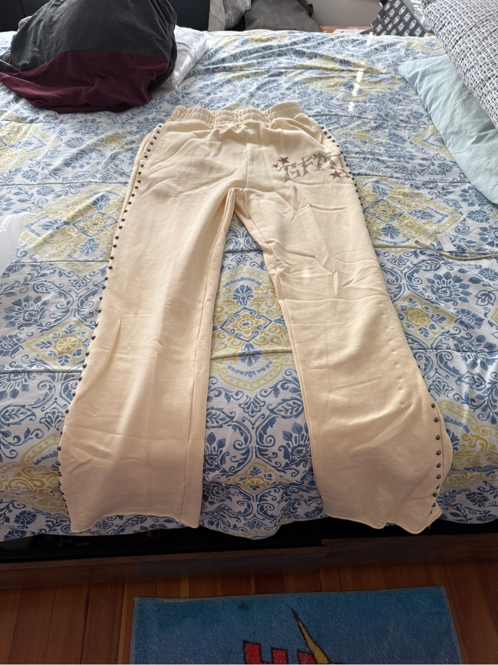 GFTDLA Cream Logo Sweatpants with Metal Charm